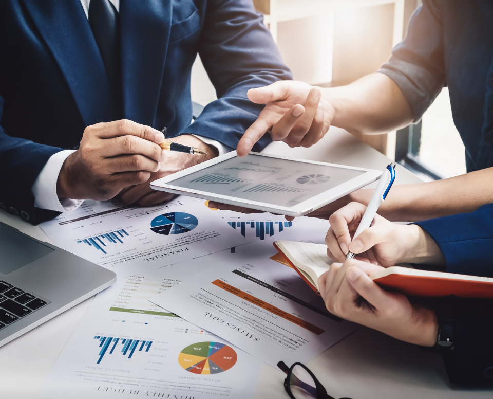 GettyImages-950986656 Business team reviewing financial data.
